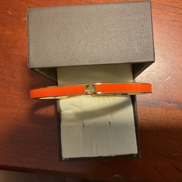 Vintage Kate Spade New York Orange Bangle Bracelet with the cut out “Spade”. - Picture 1 of 4
